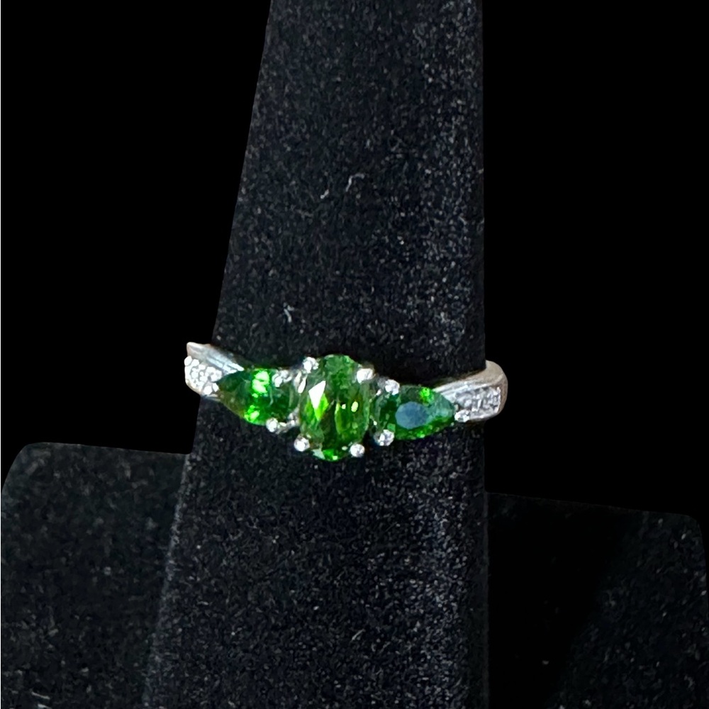 Dazzling Silver Ring with Green Gemstones